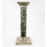 Pedestal with green veined marble column and beige base and capital
