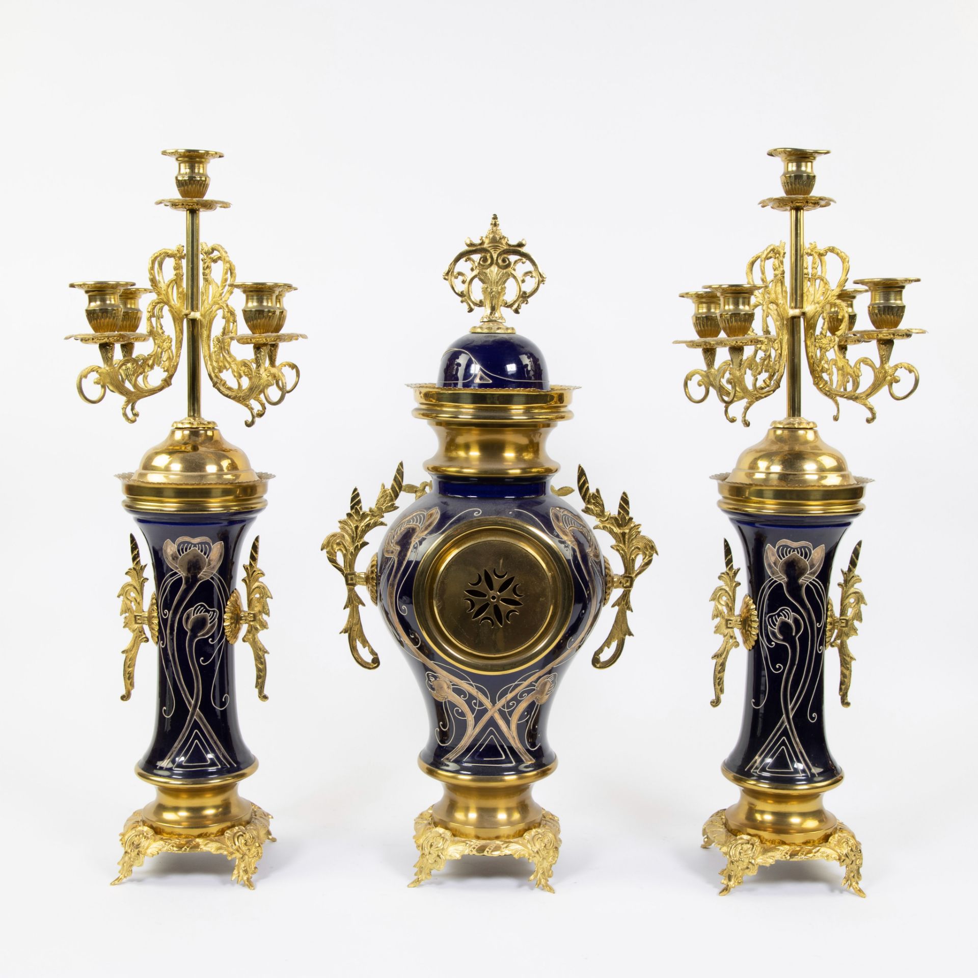 Three piece faience garnish decorated with stylized whiplash motifs and gilt brass, candlesticks wit - Image 3 of 4
