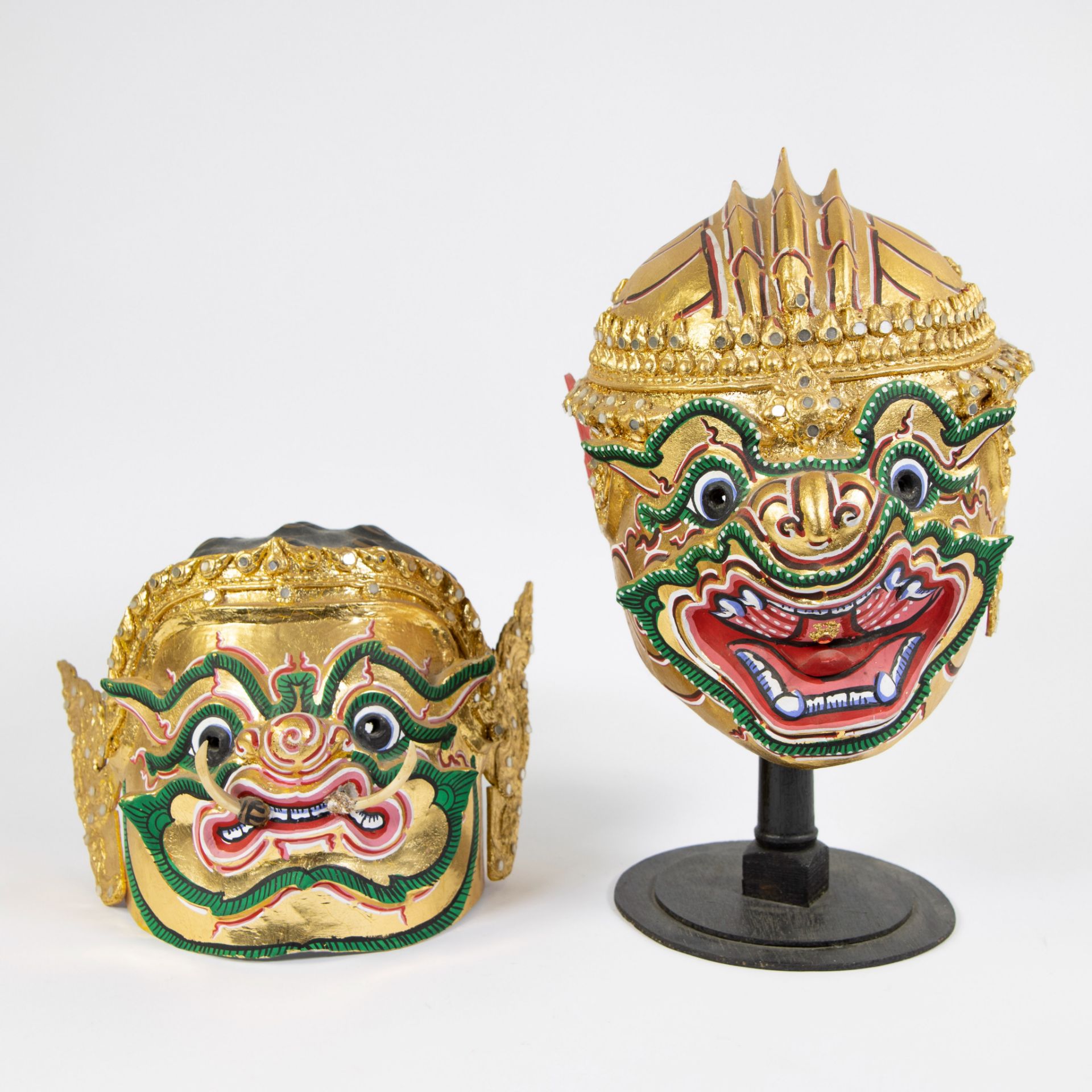 Two Thai gold plated dance masks - Khon masks in papier mache