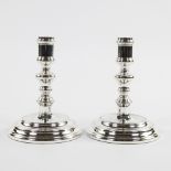 A pair of Christofle candlesticks, marked