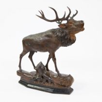 Wood carving of a bellowing deer with large antlers, Black Forest Hirschberg, circa 1910.