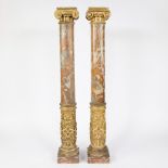 2 Ionic columns with painted marble imitation and gilded capitals