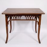 Beautiful Art Nouveau table with bentwood, patinated in a mahogany-like, red-like colour, in the sty