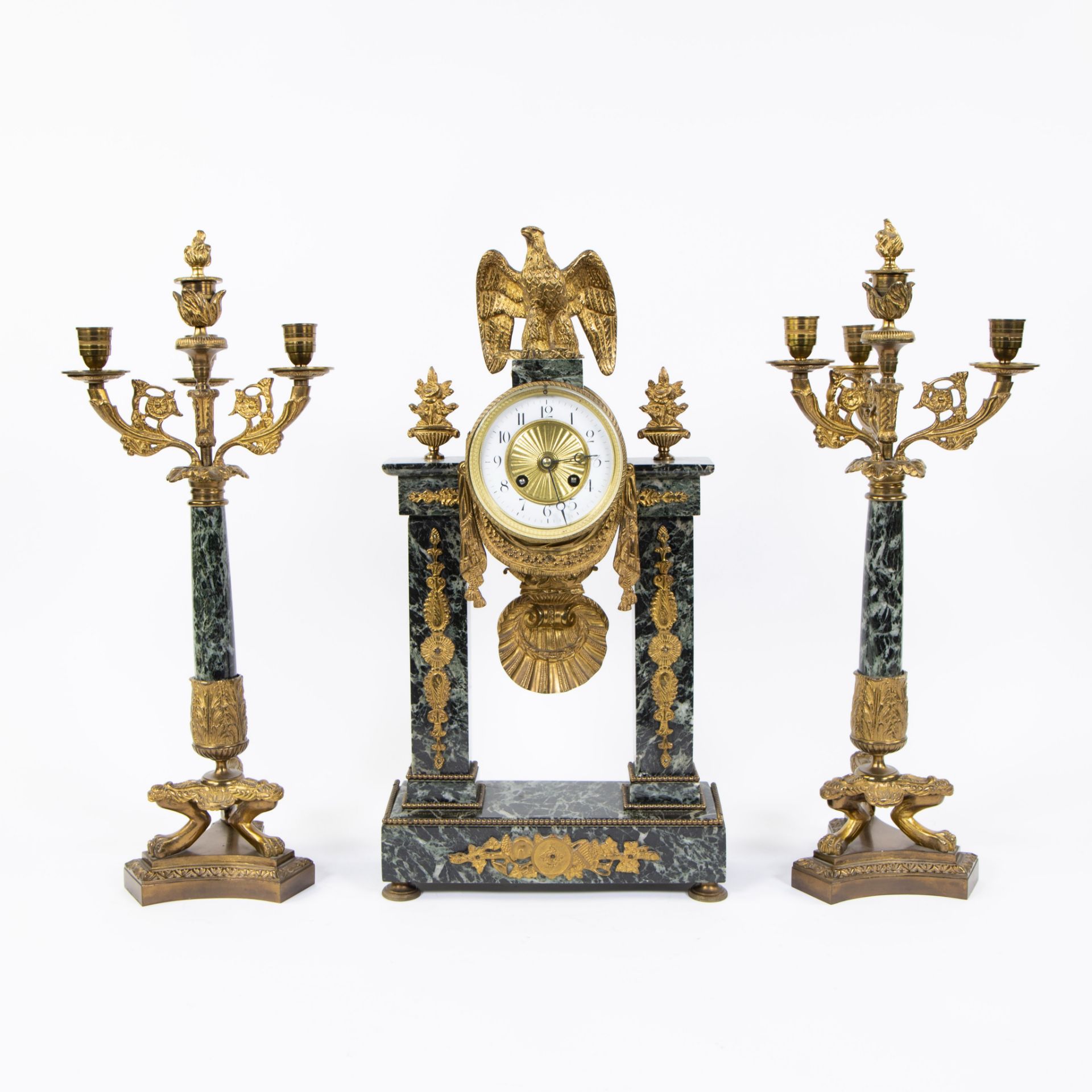 French green veined marble column clock decorated with eagle and 2 candlesticks with 4 light points,