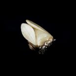 A CARVED MOTTLED JADE CICADA AND POMEGRANATE l. 5 cm