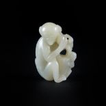 A SMALL WHITE JADE MONKEY AND PEACH GROUP h. 5 cm