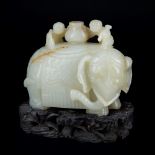 A FINE WHITE JADE RUSSET ELEPHANT AND BOYS GROUP h. giada 8 cm