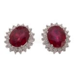 A PAIR OF GLASS FILLED RUBY AND DIAMOND EARRINGS