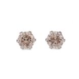 A PAIR OF DIAMOND STUD EARRINGS