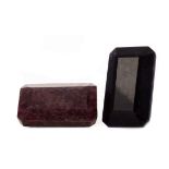 **TWO UNMOUNTED TREATED GEMSTONES