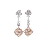 A PAIR OF ROSE AND WHITE GOLD DIAMOND EARRINGS