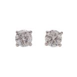 A PAIR OF DIAMOND STUD EARRINGS