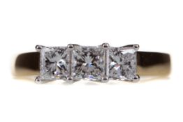 A CERTIFICATED DIAMOND THREE STONE RING