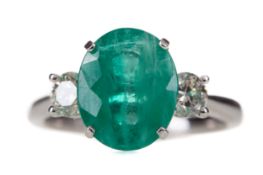 A CERTIFICATED TREATED EMERALD AND DIAMOND RING