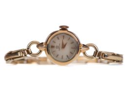 A LADY'S OMEGA GOLD PLATED MANUAL WIND WRIST WATCH