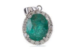 AN EMERALD AND DIAMOND PENDANT