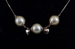 A GOLDEN SOUTH SEA PEARL NECKLACE