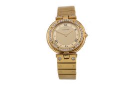 A LADY'S CARTIER RONDE EIGHTEEN CARAT GOLD QUARTZ WRIST WATCH