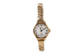 A LADY'S TISSOT NINE CARAT GOLD MANUAL WIND WRIST WATCH