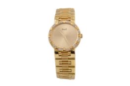 A LADY'S PIAGET 'DANCER' EIGHTEEN CARAT GOLD QUARTZ WRIST WATCH