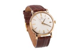 A GENTLEMAN'S OMEGA NINE CARAT GOLD MANUAL WIND WRIST WATCH