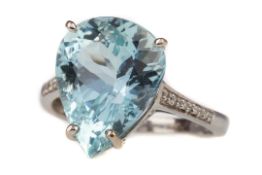 A BLUE GEM SET AND DIAMOND RING