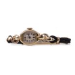 A LADY'S TUDOR ROLLED GOLD MANUAL WIND WRIST WATCH