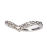 A DIAMOND WISHBONE RING