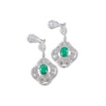 AN IMPRESSIVE PAIR OF EMERALD AND DIAMOND EARRINGS
