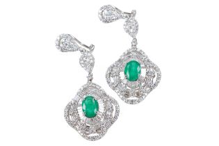 AN IMPRESSIVE PAIR OF EMERALD AND DIAMOND EARRINGS