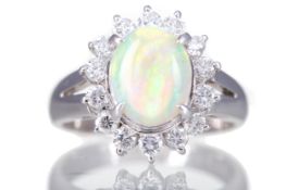 AN OPAL AND DIAMOND RING