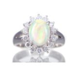 AN OPAL AND DIAMOND RING