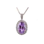 AN AMETHYST AND DIAMOND PENDANT