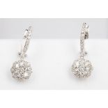 A PAIR OF DIAMOND FLOWER CLUSTER EARRINGS