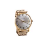 A GENTLEMAN'S BAUME GOLD PLATED MANUAL WIND WRIST WATCH