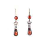 A PAIR OF GARNET AND DIAMOND EARRINGS