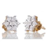 A PAIR OF DIAMOND FLOWER CLUSTER EARRINGS