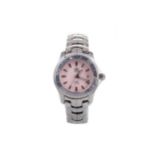 A LADY'S TAG HEUER LINK STAINLESS STEEL QUARTZ WRIST WATCH