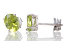 A PAIR OF PERIDOT STUD EARRINGS