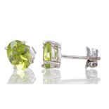 A PAIR OF PERIDOT STUD EARRINGS