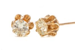 A PAIR OF DIAMOND STUD EARRINGS