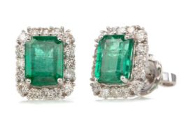 A PAIR OF EMERALD AND DIAMOND EARRINGS