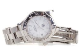 A LADY'S TAG HEUER AQUARACER STAINLESS STEEL QUARTZ WRIST WATCH