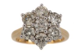 A CERTIFICATED DIAMOND DAISY CLUSTER RING