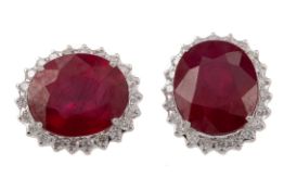 A PAIR OF GLASS FILLED RUBY AND DIAMOND EARRINGS