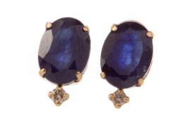 A PAIR OF TREATED SAPPHIRE AND DIAMOND EARRINGS