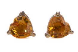 A PAIR OF HEART SHAPED YELLOW SAPPHIRE EARRINGS