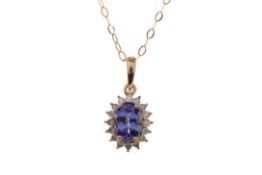 A TANZANITE AND DIAMOND PENDANT