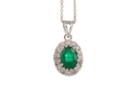 AN EMERALD AND DIAMOND PENDANT