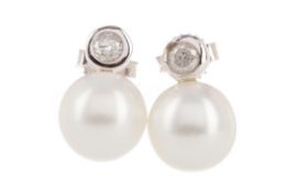 A PAIR OF PEARL AND DIAMOND STUD EARRINGS